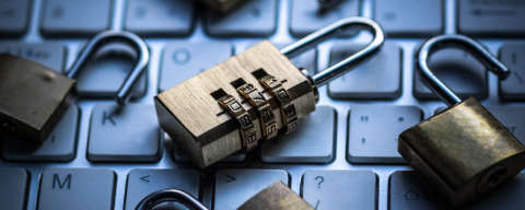 padlocks on a laptop keyboard