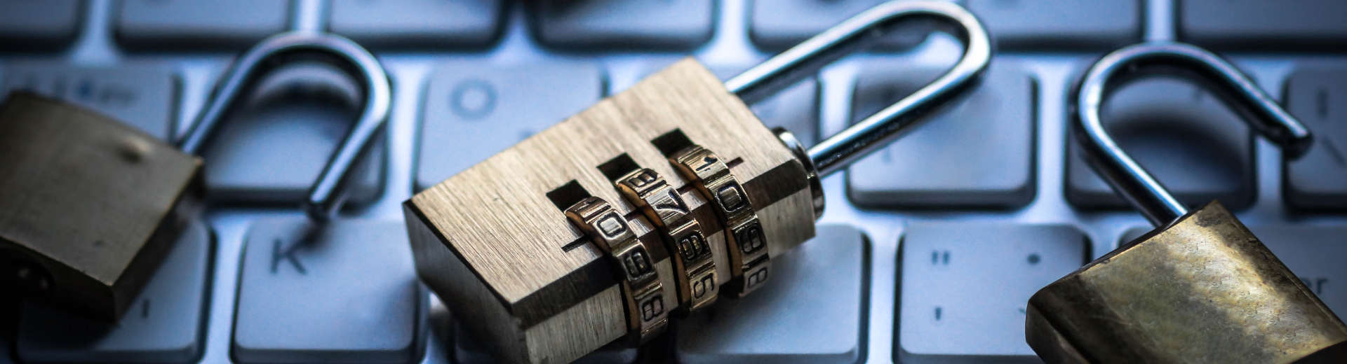 padlocks on a laptop keyboard