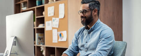 a man at his office desk