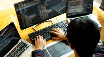 a working person using networking computers