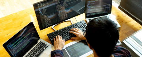 a working person using networking computers