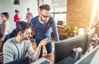 work colleagues in an office